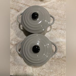 Two individual baking dishes/ bowls with lids